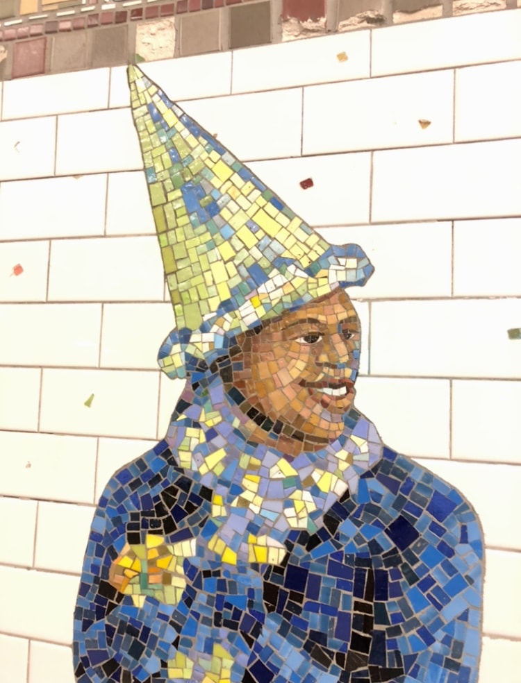 times square mosaic revelers nyc travelandledger