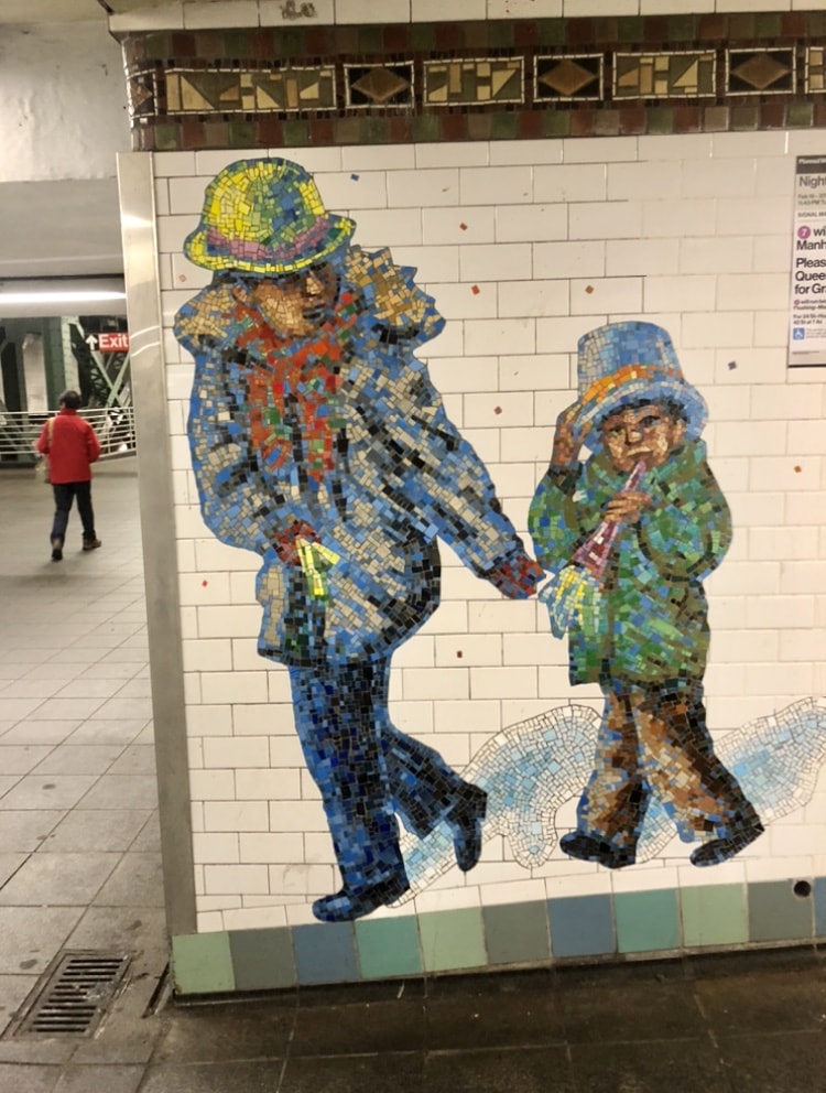 subway mosaic times square revelers travelandledger